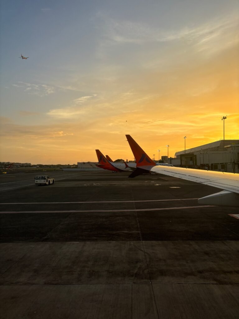 Airplane wing and airport travel scene for Frankfurt to Seoul flight planning